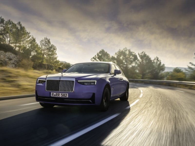 Rolls-Royce Ghost driving on road